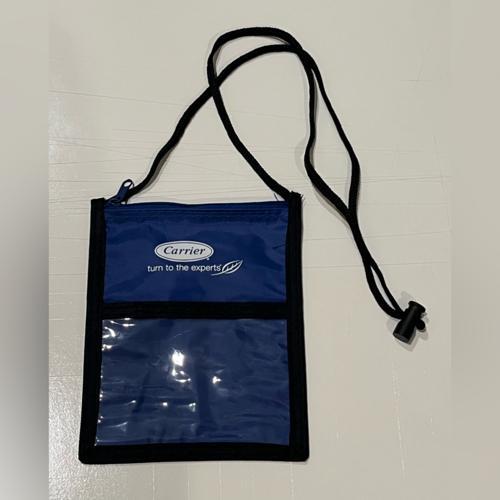 Carrier blue neck pouch.